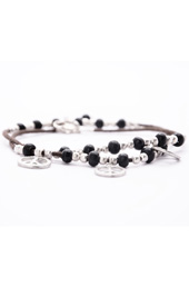 Vogue Crafts and Designs Pvt. Ltd. manufactures Peace Wrap Bracelet at wholesale price.