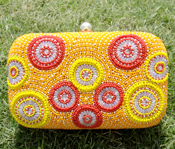 Vogue Crafts & Designs Pvt. Ltd. manufactures The Sunny Morning Clutch at wholesale price.