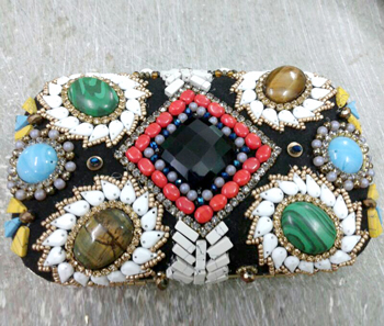 Vogue Crafts & Designs Pvt. Ltd. manufactures The Colored-Stones Clutch at wholesale price.