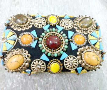 Vogue Crafts & Designs Pvt. Ltd. manufactures The Junky Clutch at wholesale price.