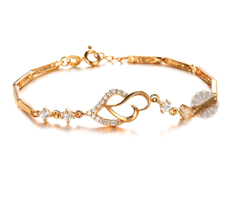 Vogue Crafts & Designs Pvt. Ltd. manufactures Diamond and Gold Heart Bracelet at wholesale price.
