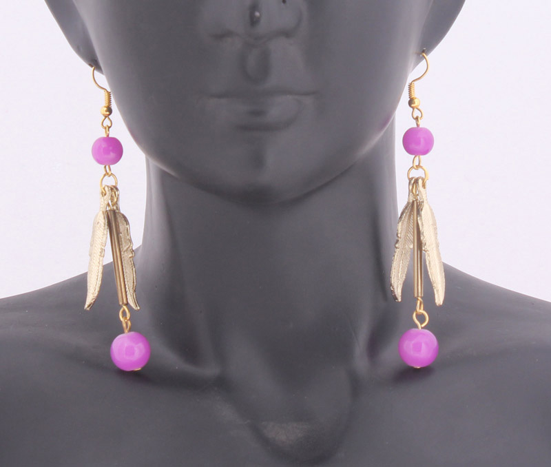 Vogue Crafts & Designs Pvt. Ltd. manufactures Feathers and Purple Earrings at wholesale price.