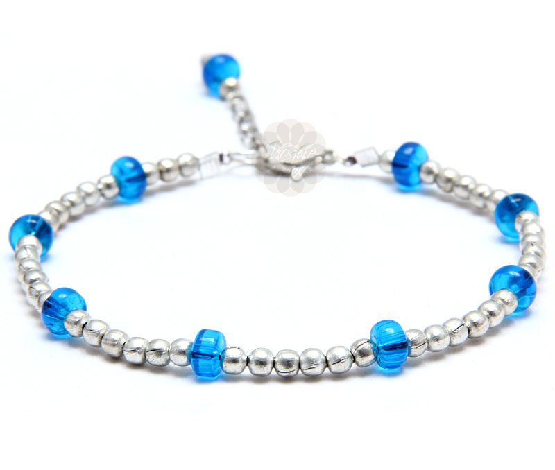 Vogue Crafts & Designs Pvt. Ltd. manufactures Classic Silver Ball and Blue Bead Anklet at wholesale price.