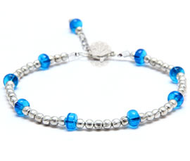 Vogue Crafts and Designs Pvt. Ltd. manufactures Classic Silver Ball and Blue Bead Anklet at wholesale price.