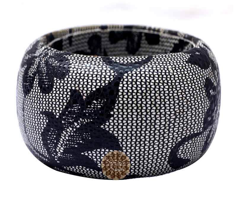 Vogue Crafts & Designs Pvt. Ltd. manufactures Chunky Black and White Bangle at wholesale price.