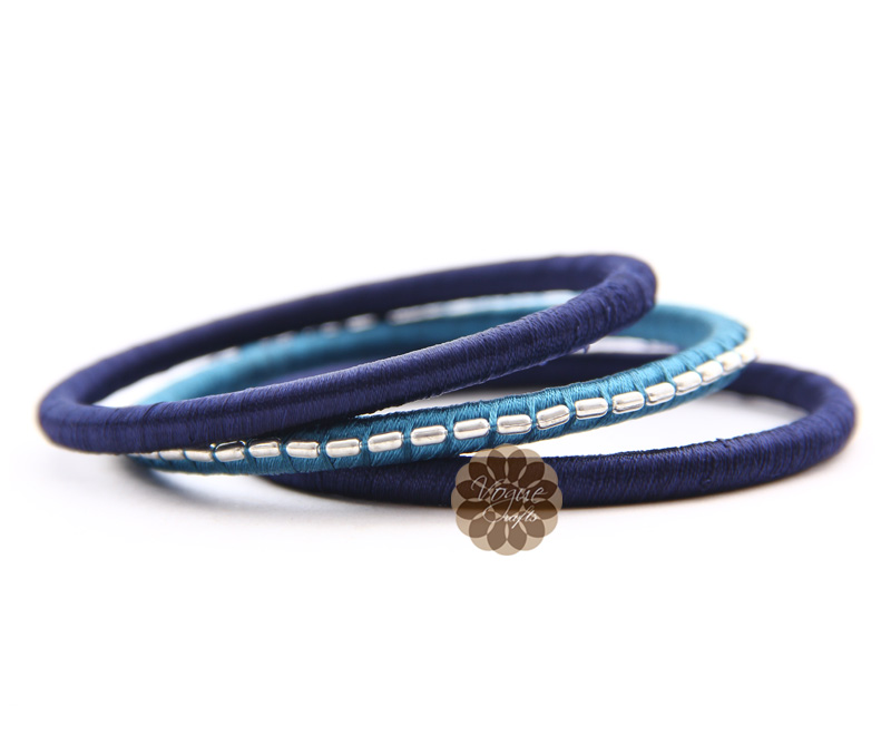 Vogue Crafts & Designs Pvt. Ltd. manufactures Blue Thread Bangle Stack at wholesale price.