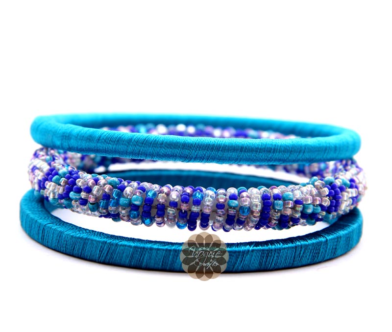 Vogue Crafts & Designs Pvt. Ltd. manufactures Teal Blue Beads and Silk Thread Bangles at wholesale price.