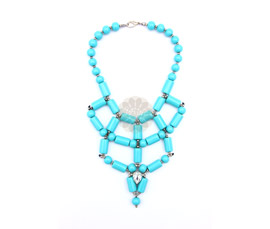 Vogue Crafts and Designs Pvt. Ltd. manufactures Rhinestone and Turquoise Necklace at wholesale price.