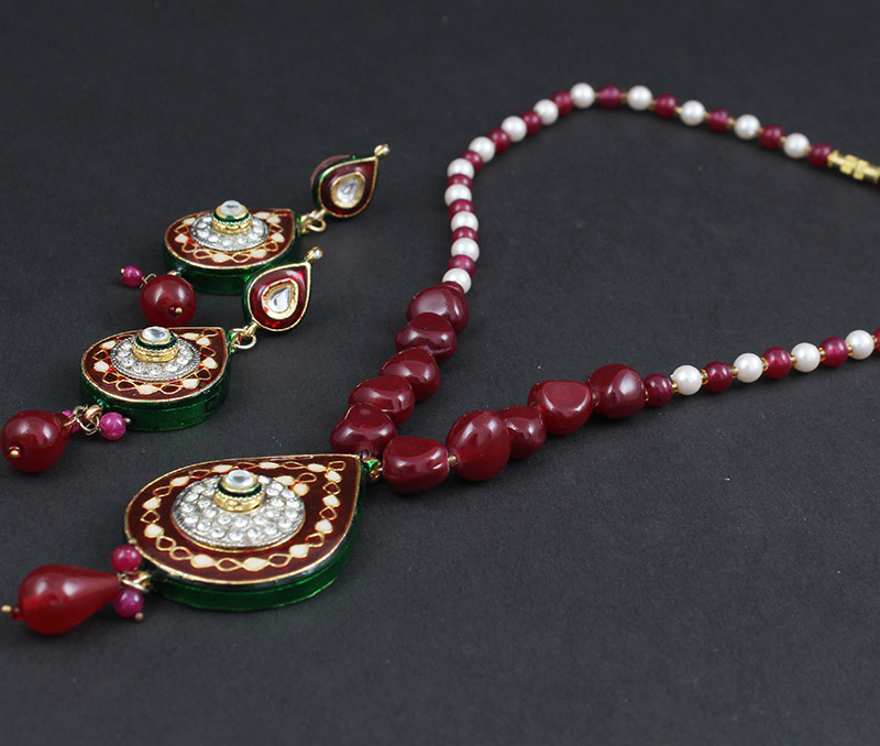 Vogue Crafts & Designs Pvt. Ltd. manufactures Kundan-Meena work Necklace Earrings set at wholesale price.