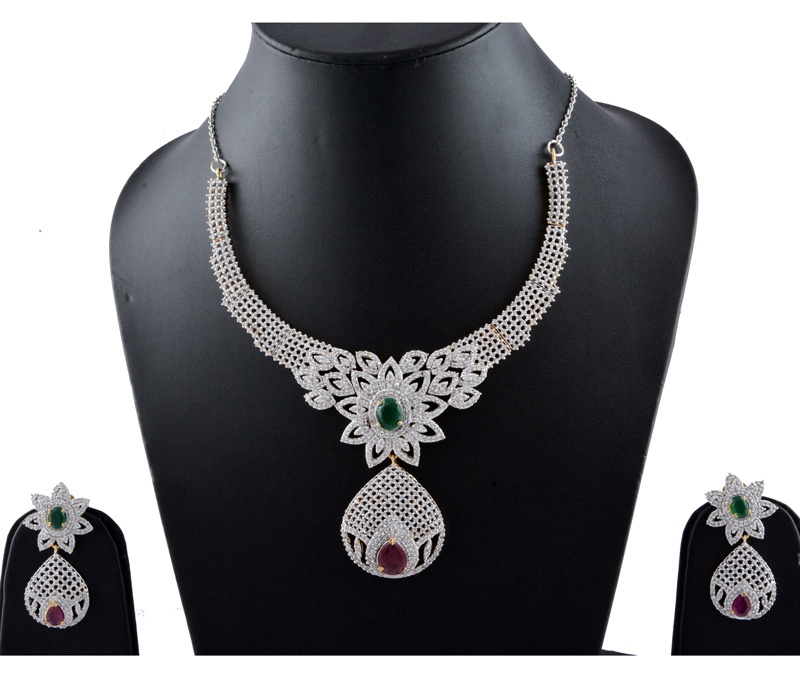 Vogue Crafts & Designs Pvt. Ltd. manufactures Rubi and Emerald Earrings-Necklace Masterpiece at wholesale price.