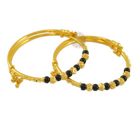 Vogue Crafts and Designs Pvt. Ltd. manufactures Black Suit Everything Pair of Bangles at wholesale price.