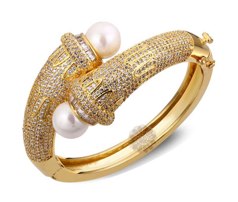 Vogue Crafts & Designs Pvt. Ltd. manufactures Cuff with Pearls at wholesale price.