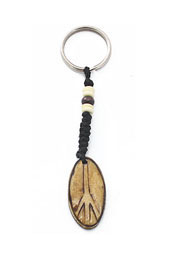 Vogue Crafts and Designs Pvt. Ltd. manufactures Oval Peace Keyring at wholesale price.