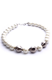 Vogue Crafts and Designs Pvt. Ltd. manufactures Silver and Pearl Necklace  at wholesale price.