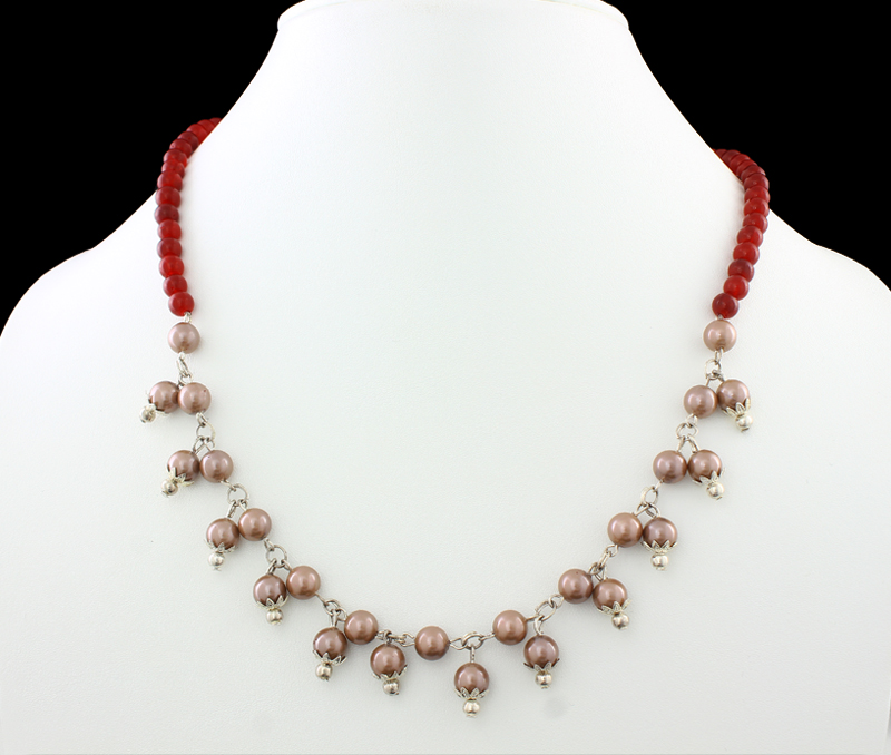 Vogue Crafts & Designs Pvt. Ltd. manufactures Champagne Pearl Necklace at wholesale price.