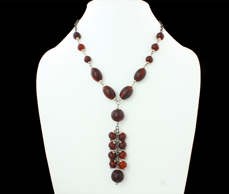 Vogue Crafts & Designs Pvt. Ltd. manufactures Maroon Horn Beads Necklace at wholesale price.
