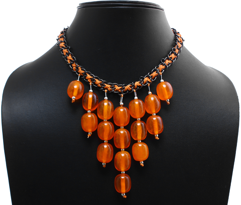 Vogue Crafts & Designs Pvt. Ltd. manufactures Orange Candy Necklace at wholesale price.
