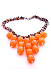 Vogue Crafts and Designs Pvt. Ltd. manufactures Orange Candy Necklace at wholesale price.