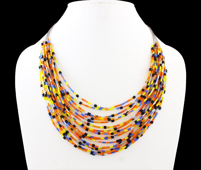 Vogue Crafts & Designs Pvt. Ltd. manufactures Strips of Color Necklace at wholesale price.