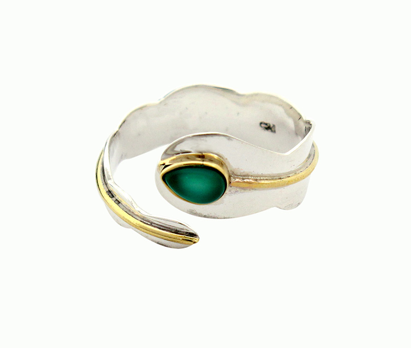 Vogue Crafts & Designs Pvt. Ltd. manufactures Green Stone Bypass Silver Ring at wholesale price.