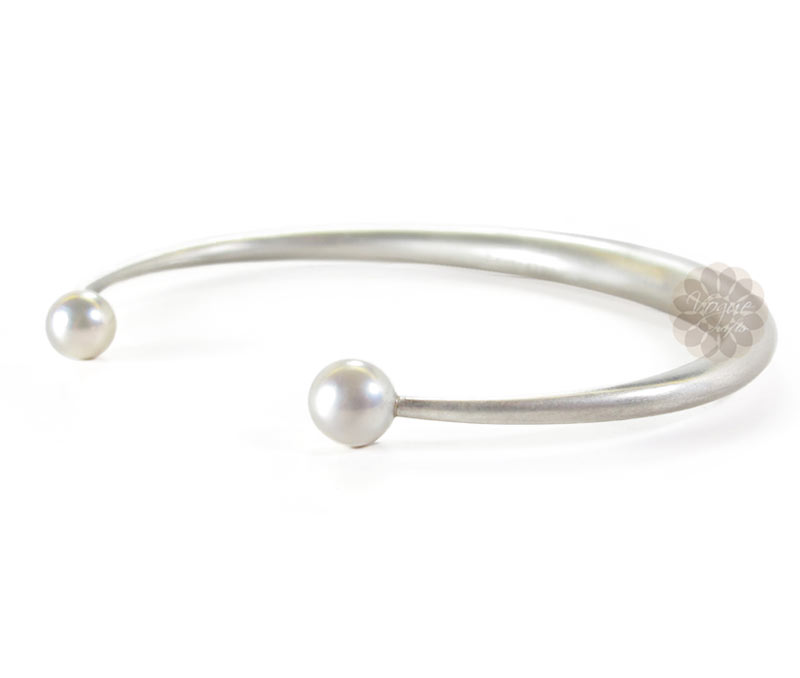Vogue Crafts & Designs Pvt. Ltd. manufactures Silver Pearl Cuff at wholesale price.