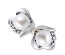 Vogue Crafts and Designs Pvt. Ltd. manufactures Pearl Silver Stud Earrings at wholesale price.