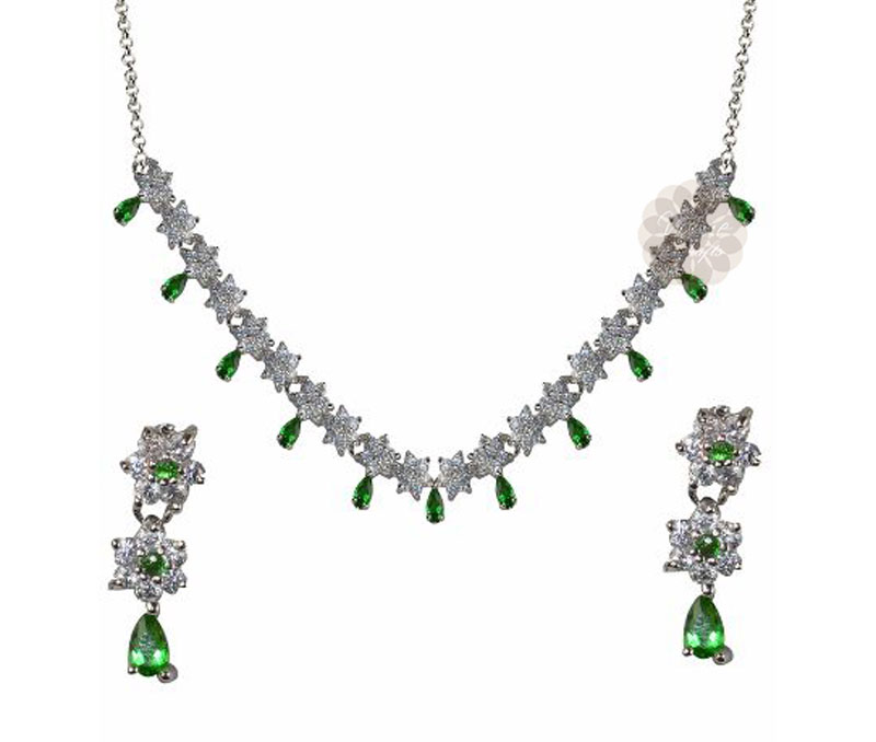 Vogue Crafts & Designs Pvt. Ltd. manufactures Green Stone Silver Necklace with Earrings at wholesale price.